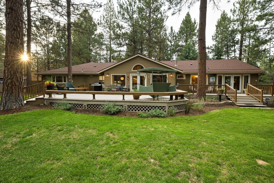 Move-in-ready home in coveted Tollgate, Sisters, Oregon. Option to purchase furnished and be home for the holidays! Meticulously maintained single-level 2,352 SF home features an open floor plan with a vaulted great room and natural light. private 0.72-acre lot bordering open space and a private ranch with nearby access to forest trails. The interior features a great room, 3 bedrooms, 2.5 bathrooms, a dedicated flex/craft room, and a reading room/library/office. Extensively remodeled with a new roof in 2017. The property is fully fenced and cross-fenced with a remote-operated gate. The private backyard oasis has a large deck, lush lawn, mature plants, and a greenhouse with raised garden beds. Ample storage and parking: 3-car garage, side yard storage, plus two storage sheds. Tollgate amenities include a saltwater pool, playground, sports courts, and more. 2 miles from shops, restaurants, and schools in charming downtown Sisters, Oregon.