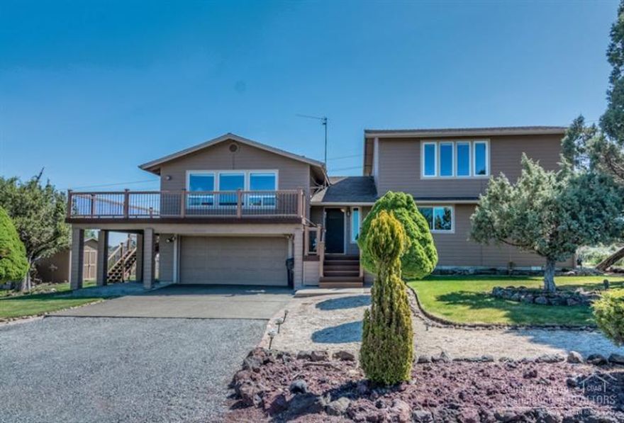 Fantastic Cascade Mountain views, Two Master suites. One master suite with bath on Main level. Huge walk in closet.newer 750 Sqft foot spacious master suite, Multiple trek deck with 25 year guarantee not to stain or scratch, One acre beautifully landscaped yard with gardens with watering system. RV Parking. Wonderful location on top of forked horn butte.