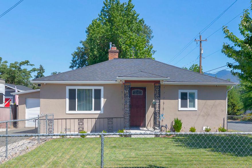 Great location and pride of ownership!! Charming 2 bdrm, 1 bath, 988 sq ft cottage/bungalow close to shopping & medical. Lovely gas fireplace in the living room with built-ins, beautiful kitchen, bathroom has double sinks and a tile shower. Loads of updates in 2020 include; kitchen remodel with stainless steel appliances & stone coat counters, four mini splits, laminate flooring, carpet, roof, gutters, exterior paint, windows and most all electrical and plumbing were replaced. Recently painted on the inside, new garage door, new blinds and new water heater in May. Low maintenance fully fenced front and back yards have sprinkler systems on timers and back yard is ready for a spa. There is a workshop that could potentially be turned into an ADU or guest quarters and a bonus shed for extra storage. Second driveway for potential RV parking.  Don't miss this one!!