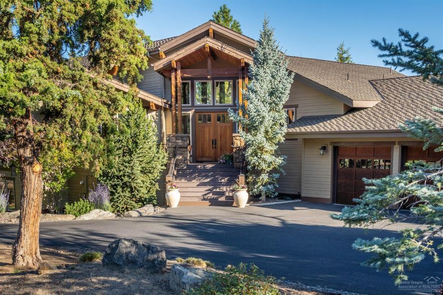 Welcome to the entertainers dream in the desirable Westside of Awbrey Butte. A builder's custom home, boasts 2 story vaulted open great room, w/ enlarged wood-wrapped windows from beautiful vistas of the mtns., romantic 2-story fireplace (w/ surround sound), with immense natural light & is extremely well insulated. Chef's kitchen with upgraded appliances leads you to the delightful & expansive patio w/ trex decking and hot tub staged outside of the elegant master suite on main floor. Custom wood floors & modern travertine tile. Dual furnaces/AC units. Something for everyone, including direct access to River Trail North. Don't miss this unique opportunity!<br>