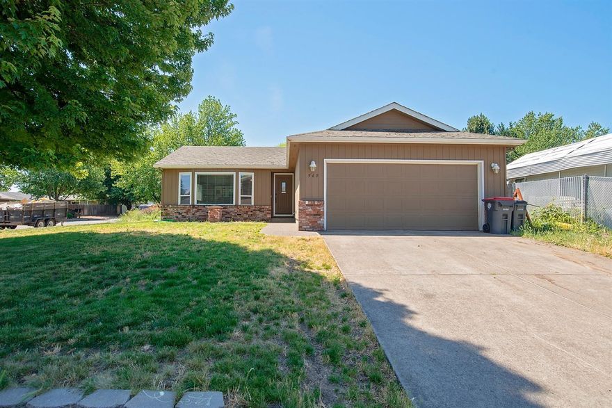 This 3 bdrm, 2 bath corner lot home has lots to offer. Kitchen is open to the living room w/vaulted ceilings, concrete counter tops, beautiful stress wood laminate flooring in kitchen, dining, entry way and halls. French doors off your dining area lead to cozy sitting/office area with views of the expansive back yard. Master Bedroom has walk-in closet, trey ceiling w/fan and private bathroom w/ tub/shower combo. New vinyl Tile in both Master bath and guest bath. Two additional good sized rooms, laundry room w/extra storage including New Vinyl Tile, & 2 car attached garage with plenty of room in your yard for enjoyment. Come and take a tour!