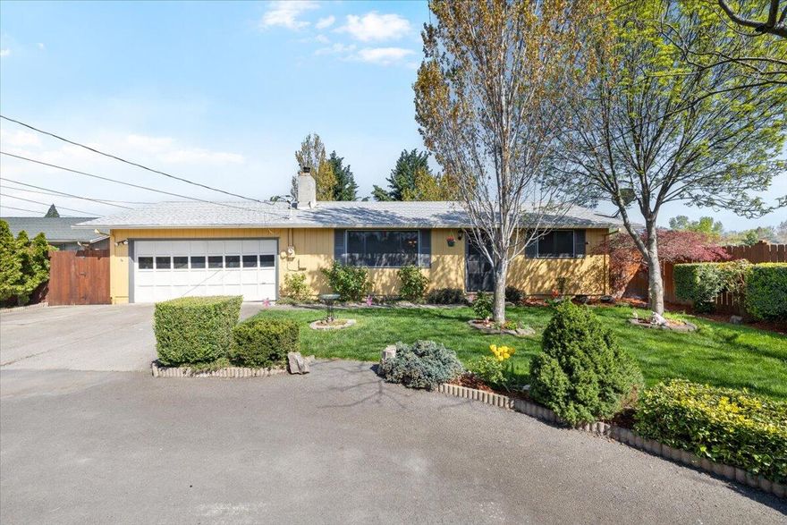 Charming home nestled at the end of an expansive flag lot and surrounded by the serene beauty of Kennedy Park, this 3-bedroom, 2-bath gem offers the perfect blend of privacy and convenience. Step through your private backyard gate and enjoy direct access to the park—a rare find! Set on a generous .33-acre lot, this property features lush fruit trees, a spacious covered patio, and plenty of room to garden, entertain, or simply unwind. With 1,160 square feet of cozy living space, this home is full of potential, ready to make your own. Located close to  schools, shopping, and everyday amenities, this hidden haven combines tranquility with accessibility. Don't miss your chance to own this unique and inviting property!