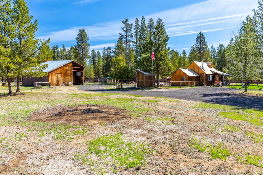 This secluded and off the beaten path 5-acre getaway is very private and includes a rustic cabin with vaulted ceilings; the 2nd bedroom is currently being used as an office. The vintage wooden barn has a tool room and storage loft. Also features a large chicken coop, extra-large chicken pen, & fenced garden area. Whether you're creating a homestead, hobby farm or simply country living you'll love this property. The adjacent land to the north is BLM which brings peace and quiet as well and ensuring no chance of further development. Wildlife is abundant. At the same time a short travel of 15 minutes to La Pine with a full range of amenities. This is a turnkey listing with a fully furnished cabin as well as shop tools, makes it move-in ready. Is in Klamath County which ensures lower property taxes. The adjacent 5-acre tax lot with electricity, well & septic installed is also available, which gives buyers a lot of flexibility. Interested? Don't miss out on this rare opportunity!