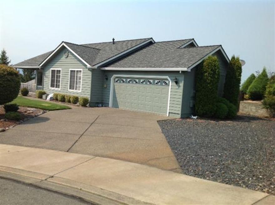 Location, views and a home that has been lovingly maintained. It doesn't get better than this. In a wonderful nicely kept neighborhood on a cul de sac and there are views from most windows. This beautiful home features an open floor plan with great room, dining area and kitchen. Large master with walk-in closet, door to patio and mood lighting on plant shelves in master and kitchen. Large RV parking (28'X 40'), large back deck with Trex decking and partially covered. New roof and exterior paint in 2012, new counters in kitchen and bathroom. Kitchen with plenty of cupboard space, lazy Susan, walk-in pantry, and mountain view from sink. Very easy landscaping. Immaculate 2-car finished garage.