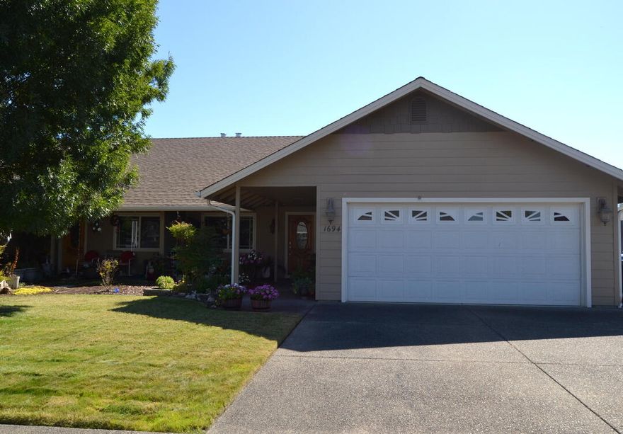 Outstanding investment! This immaculate duplex, built by respected builder Kirk Chapman for himself, has never before been offered. Designed with custom-home quality, not rental grade, each single-level unit features 2 bedrooms, 2 baths, vaulted and coffered ceilings, a spacious kitchen, stone fireplace, covered porch, and a 2-car garage. Set on over a quarter acre at the end of a quiet street with extra parking, this property has been carefully maintained and updated—an opportunity that won't last!