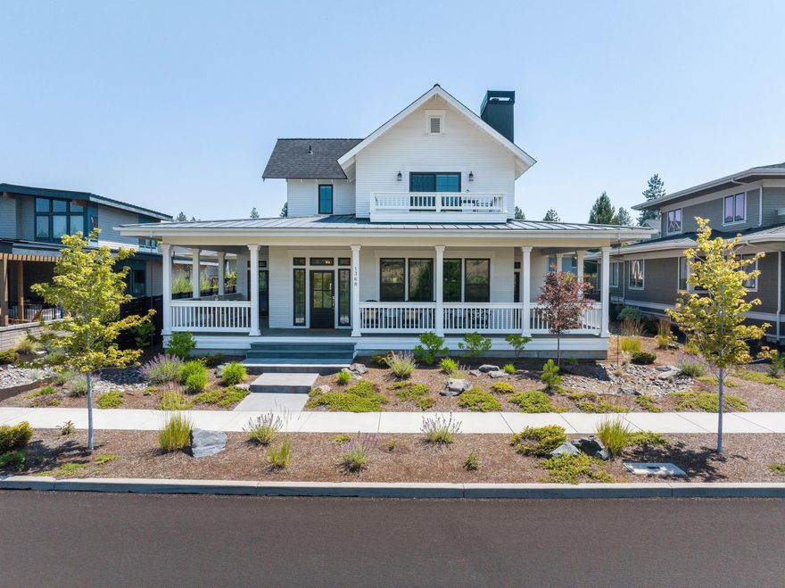 Located along one of NW Crossing's most desirable streets, this modern farmhouse captures serene Lakefront views of Discovery Park, paired with timeless neighborhood charm. The wraparound porch invites you to unwind & take in the scenery - striking in every season. Inside, high-end finishes meet comfort and style with a thoughtful layout, marble kitchen counters, custom cabinetry, stainless steel appliances, & seamless flow to the covered patio—the ideal atmosphere for year-round entertaining. The main level primary suite is the perfect retreat with park views, a spa-like ensuite & spacious walk-in closet. Rounding out the main floor, you'll find a bright office & laundry room. Upstairs, a spacious bonus room opens to a private patio with sweeping views, accompanied by two bedrooms & a full bath. With an attached two-car garage & close proximity to trails, top schools, shops, & the farmers market—this is Bend living at its finest.