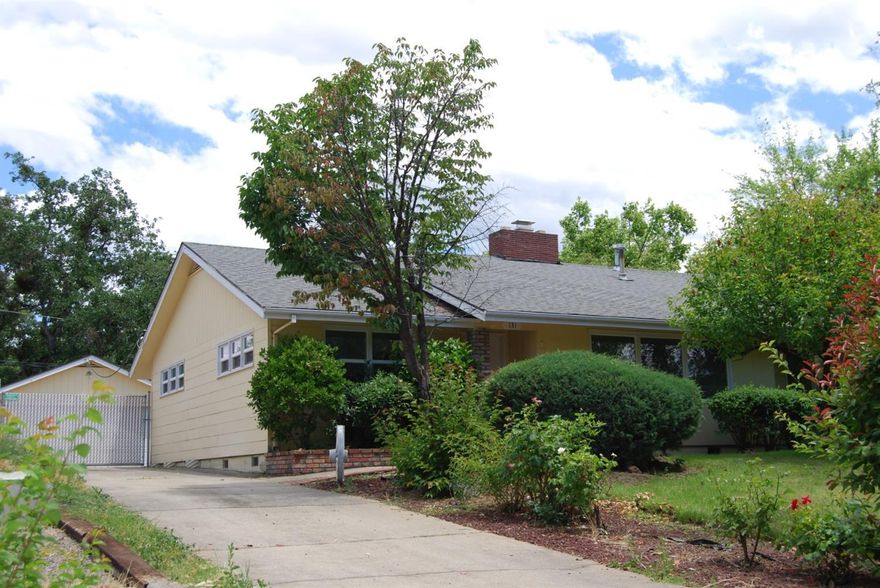 Truly retro 1952 home on almost a quarter acre lot in East Medford. Home has been updated with a HVAC system and double paned vinyl windows. It has a cozy working fireplace, tile counters, a large laundry/mud room and extensive storage. The home sits back in on a large lot, offering privacy and a beautiful yard to enjoy. Inside the gated drive is a large garage/shop as well as a small garden shed. Excellent location close to Medford Center, downtown and medical facilities.