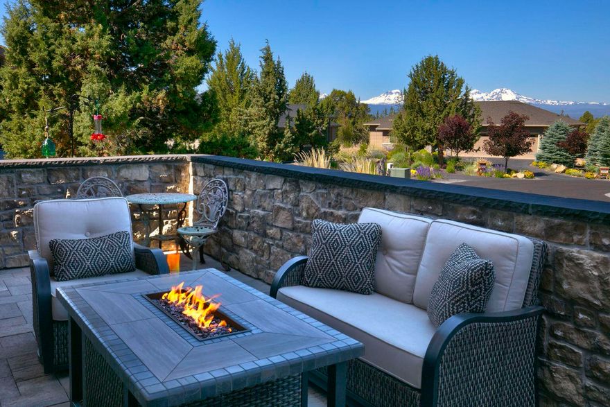 This stunning Northwest Contemporary home, situated on a quiet cul-de-sac in the award-winning Eagle Crest Resort offers a luxurious and amenity-rich living experience in the picturesque Central Oregon landscape! Ownership includes fitness centers, golf courses, pickleball and tennis courts, swimming pools, restaurants, trails, and more.. This single-level home features a stunning open-concept floor plan, and at the heart of the great room is a cozy gas fireplace, custom built-in cabinetry, & floating shelves, while at the center of the bright, open kitchen is a spacious island, perfect for casual entertaining. Seamless functional living space and modern finishes are found throughout the house. Enjoy the outdoors and take in the stunning sunsets from the expansive paver patio in the back or the cozy courtyard space in the front with impressive views of the Cascade Mountains. Don't miss this magnificent dream home!