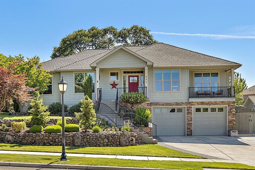 You are sure to appreciate every attention to detail in this custom home. Stunning hardwood floors accent much of the primary living area. There are skylights, solar tubes & incredible natural light throughout. It's a true entertainer's delight. Open kitchen features granite countertops and a roomy dining area adjacent to the great room. There is a versatile nook with direct access to the slate balcony, complete with valley views. Roomy master suite features a tiled bathroom, walk-in closet, coffered ceiling and direct access to the lush and private backyard. Entertaining in this home is a real delight. There is an expansive, 500+ SF Trex deck with oversized sun shade and lots of room for exploring. The oversized garage, extra deep driveway and RV parking provide ample room for vehicles plus there is a 400+ SF workshop for your hobbies or just tinkering. Incredible storage, high ceilings, raised garden beds plus berries and many mature trees and shrubs.