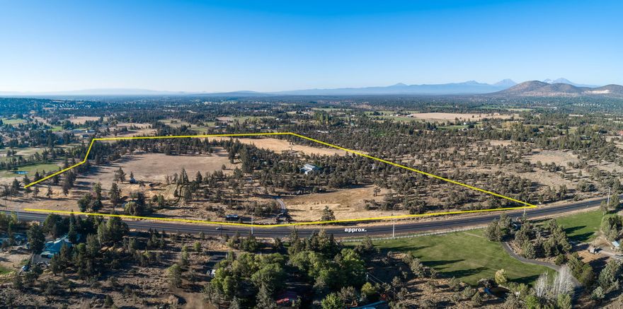 Amazing investment opportunities available on this gorgeous & expansive, 55 acre, EFU zoned acreage property with 21 acres of irrigation rights located in SW Redmond, and is right outside of city limits.  This wild west acreage property offers expansive Cascade Mtn Views, pastures, and a large pond. Additional features include a 4200 SF garage/shop with 1800SF of space above, which was built in 2006, along with a 1482 SF, 1946 farmhouse, a detached 3 car garage, multiple outbuildings & barns. The 55 acre property provides total privacy & space, and is a perfect opportunity to build your dream home from its highest point to maximize Central Oregon's sought after Cascade Mtn. Views & the ability to look upon your sweeping green pastures & large pond. Property is sold AS-IS, OWC with acceptable terms & is located right outside of the City of Redmond's Comprehensive Plan for Residential Development.