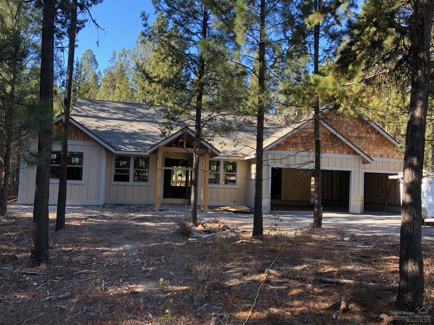 Brand new 1 level home with Deschutes national forest in your backyard! Great location that's close to Sunriver and Mt Bachelor. 4 bedrooms, 2 bathrooms, 3 car garage. Kitchen well equipped with solid surface counters, knotty alders cabinets, and black stainless steel appliances. Knotty alders solid core doors and trim. Tiled shower and solid surface double vanity in master bath. Very spacious with vaulted ceilings in nearly every room. Estimated completion date February 15, 2020.