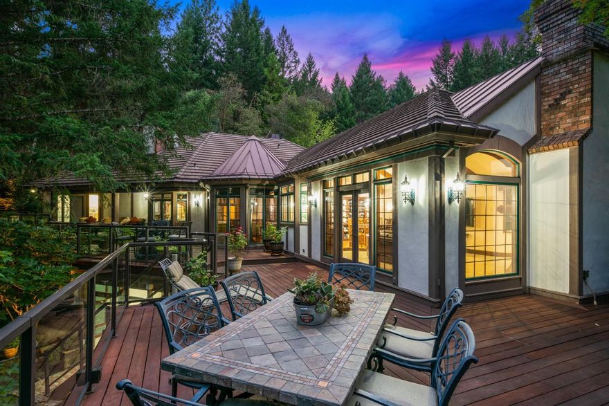 Welcome to the Yantis Estate located in beautiful Southern Oregon. Nestled in the foothills just outside of the charming town of Grants Pass, this 29 acre estate is one of most dynamic in the region. Featuring a main residence with distinguished craftsmanship and complete privacy with elaborate landscaping, meandering waterfalls and ponds, a state-of-the-art fitness center with pool, athletic court, two additional residences, lush gardens, a climate controlled conservatory, horse facilities and more. Including all of the homes and structures on the property, there is over 20,000 Sq Ft under roof. A discerning buyer will find a lifestyle that is luxurious in nature and also allows for the opportunity to enjoy the benefits of rural living that include the ability to have freshly grown food, partake in activities like horseback riding and hiking plus being able to take a break from the fast paced world and savor the relaxing small town culture.