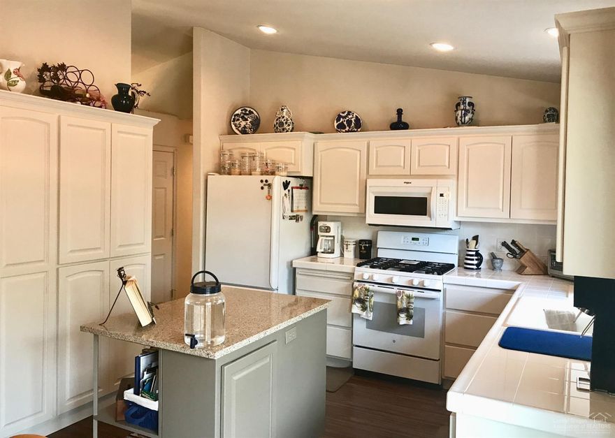 4 bedrooms, a huge private back yard, 5 minutes to Old Mill restaurants and shopping, with a freshly updated kitchen and interior fixtures in the lovely Tanglewood neighborhood, for $369,900? YES! And with a hot tub, cozy outdoor entertaining areas, A/C, RV parking, 2 living areas, lots of storage, and an included one year home warranty (5 years on new kitchen appliances), this bright home is perfect for a young family, or a true bargain for an investor looking for a rare 4 bedroom rental at this price.