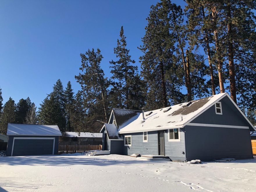 Refreshed and darling, this 1930's-era original farm house has been updated with a modernized, open feeling interior, including timeless touches from hard wood floors, to rolling barn doors. in this well-built home.