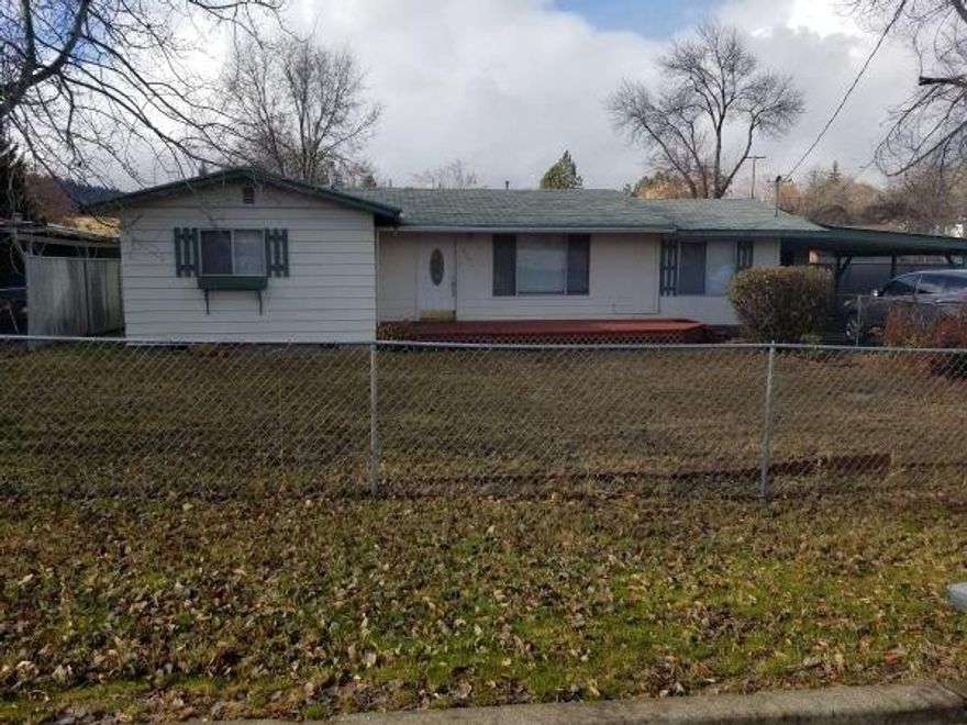 This home is immaculate. Freshly painted inside. Very nice kitchen with newer appliances and oak cabinets. New hot water heater. Beautiful wood floors in kitchen and dining room. Tile flooring in both bathrooms. Large backyard that is all fenced with hot tub off deck. Garage has big area that could be used as shop big work area. Hot tub is not warranted sold as-is.