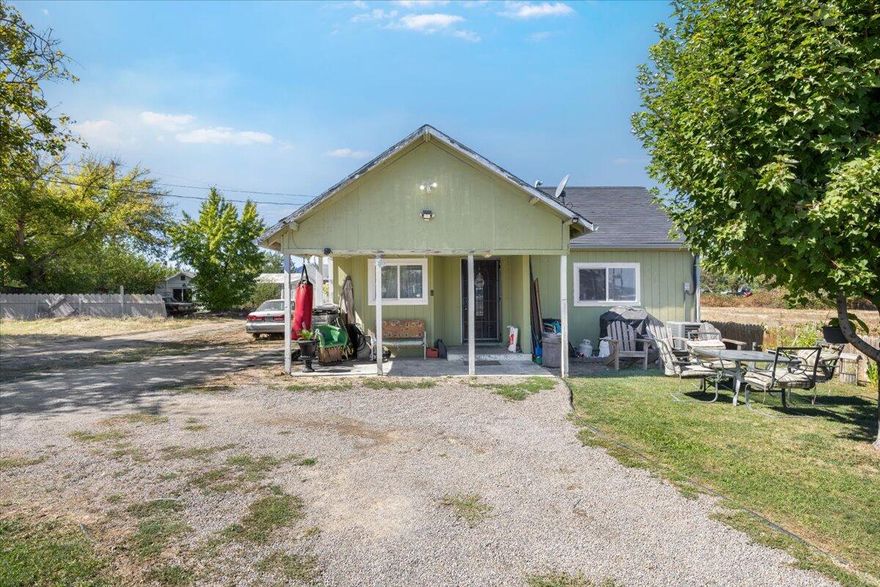 Step inside this inviting home featuring a beautiful kitchen with stainless steel appliances and gorgeous cabinetry. A designated laundry room adds convenience, while the spacious layout offers both a bright living room with soaring ceilings and a versatile second family room, complete with double French doors leading to the backyard. Enjoy your private, fully fenced yard with a covered back deck—perfect for relaxing. The property also boasts a generous loop driveway with plenty of parking. Schedule your showing today!