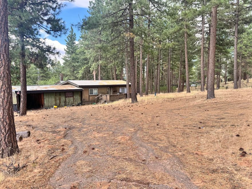 2 bed, 2 bath 1977 manufactured home on 17 fully fenced acres, sold with 2 tax lots. Perfect for horses or livestock with plenty of space to roam. Enjoy privacy, country living, and room to expand. Inside photos coming!