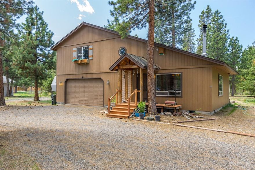 Comfortable, cozy, cabin like home with granite counter,stainless steel appliances & alder wood cabinets in the kitchen. Fantastic wood stove to enjoy on those cool evenings. 2 Lg bedrooms upstairs (fits king beds). Garage is Lg 24'x28' insulated & heated. Out back is RV Hookups. Shop & Storage bldg, fenced & gated. Come buy and see this gem of a home.