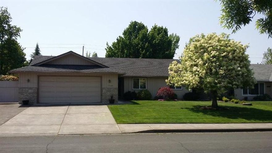 Attractive, well-maintained 3 bed, 2 bath home in the Lone Pine School District won't last long. The open kitchen, with oak cabinets and floors, includes all appliances - a dishwasher, a new oven/range, new exhaust hood and a new refrigerator. The washer and dryer are also included - so the house is move in ready. There is a formal dining area off the kitchen and a separate large living room with bay window. The existing comp roof was installed in 2002 per previous listing in 2011. The home rests on a fifth of an acre and features a fully fenced well manicured back yard with porch patio, and a huge gated and paved RV parking area. Situated on a residential street away from heavy traffic, yet conveniently located to area shopping and less than a mile from Lone Pine Elementary School. Home warranty included!