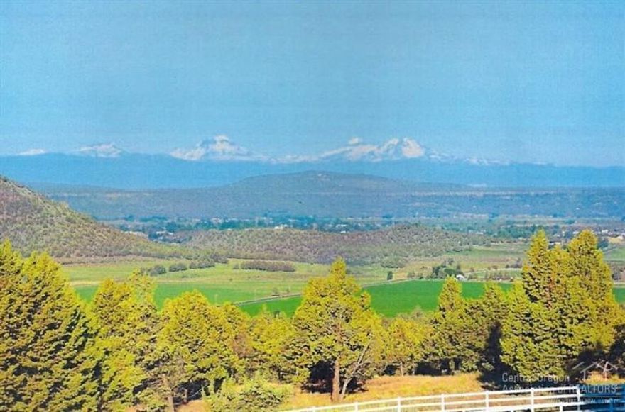 Western Sunsets Executive living/Incredible Cascade Mountain & Ochoco Valley Views. No 2 sunsets or sunrises are the same. 10,000+ sq ft of custom living with a large Indoor pool, expansive outdoor decking,& privacy. Huge shop, 2 stall barn, paved drive and much more. A must see and great value! Seller has 2 additional residential lots adjoining.