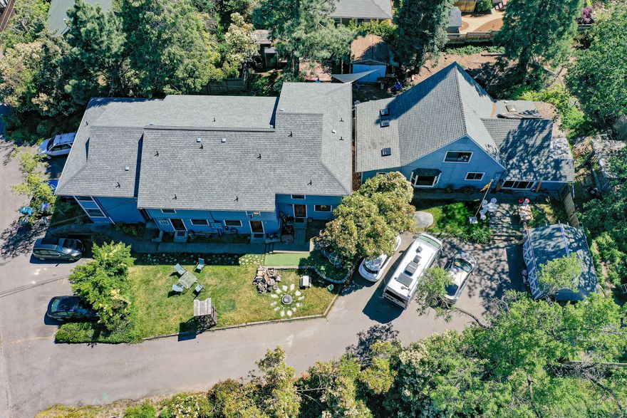 Hard to find multiplex until in great Ashland location. The apartments were originally a 4 plex with a separate home. The current owners converted it to a triplex to allow for a owner occupied loan. It could be converted back to a 4 plex but is subject to tenants rights. Two story units that have been updated. New bathroom in main home and the middle unit. The main home was recently remodeled . Close to the plaza. Ample parking for tenants.