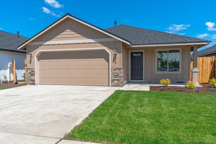 New & efficient Hickory FP in quiet NW Redmond neighborhood. 3 bd, 2 ba, 1,425 sf of living space. Lg great room w/ plenty of space to entertain. Living room is open to dining w/eating bar & kitchen island, solid surface counter tops, all stainless energy star appliances. Gas forced air w/high efficiency furnace & plumbed for AC. Double garage w/covered front & back porches. Front & back landscaping w/auto sprinklers, fully fenced. See our model home @ 3005 NW Cedar Ave. for all finish packages. Home is NEAR COMPLETION. Interior package shown is of the hickory floorplan with alternate design package, this particular interior will boast warmer tones, see model home to preview. Love the layout but want to choose your own finishes? Ask us how!