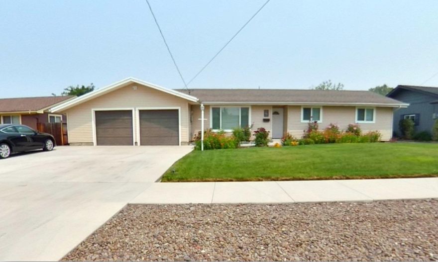 Lovingly cared for and nicely updated, this home is currently used as a four bedroom house. The fourth bedroom was built as a family room, but it currently used as the master suite, located on the opposite end of the other 3 bedrooms, with his and hers closets and a bathroom. The Layout lends itself to a host of uses. Don't overlook the small laundry room, accessed from the kitchen. Comes with refrigerator, washer, dryer, dishwasher, and range/oven, and window blinds throughout. Has an attached two car garage and RV Parking. East Medford home, located in a nice area, with a good size yard and close to hospital, medical services, shopping, entertainment and restaurants.