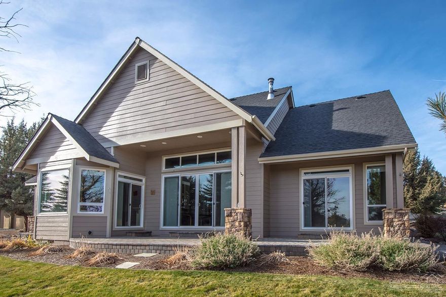 Feel warm and fuzzy in this highly upgraded home with solid red oak flooring, kitchen with quartz counter tops, stainless steel appliances and solid raised panel birch cabinets. Invite your friends, there is a 2nd master suite. Live comfortably just like a single story home with all the rooms (except bonus room) on the entry level. Easily fit your 2 autos in the extra wide attached garage. Enjoy the newly installed paver entry and back patio with views of Powell Butte to the east. Welcome home!