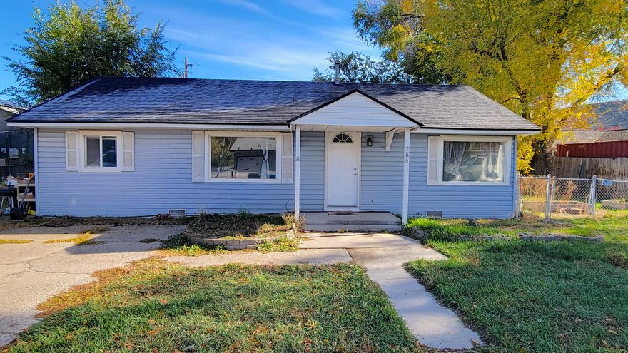 2 bedroom 1 bathroom home on a good sized lot with alley access! This 960 sqft home has some updated flooring with boxes of flooring left, new well pumps, a new roof in 2020, and updated vinyl windows. Spacious back yard with a covered patio, and a shed for storage!