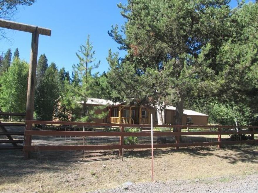 What A Nice Place In The Country Within About 3 Miles Of A Small Community. This Home Sits On The Middle Of 1.5 Acres And Is Surrounded By Nice Aspens And Pines Even A Blue Spruce. The Home Is A Very Nice Manufactured Home 1500+ Sq Ft. 3 Bedroom 2 Bath Could Be A 4th Bedroom ,It Is A Den Now . Has A Concrete Sidewalks And A Breezeway Between Home And Garage. All Fenced, Even Has Room For A Horse. Access To The Williamson River For Fishing Or Canoeing.