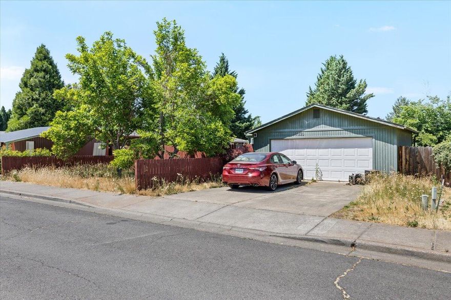 Discover this thoughtfully laid out 1,782 square foot manufactured home on a 0.19-acre lot, featuring 3 bedrooms and 2 full bathrooms with thoughtful details throughout. The master bedroom includes a spacious walk-in closet, while the kitchen boasts abundant cabinet storage for all your needs. Conveniently located near South Medford High School, this property offers comfortable single-level living with plenty of outdoor space, making it perfect for families or anyone seeking a home waiting for a buyer to give it their personal touch in a desirable school district.