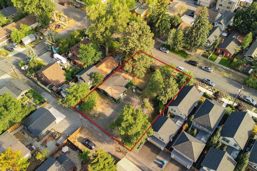 INVESTOR/ BUILDER ALERT with 3 lots in prime location on the West side of Bend! This .23-acre property has massive potential for building multiple units in an ideal location or renovate/ add on to the original home. Alley access in back adds great access and walking distance to many great restaurants, parks and amenities including downtown just minutes away.