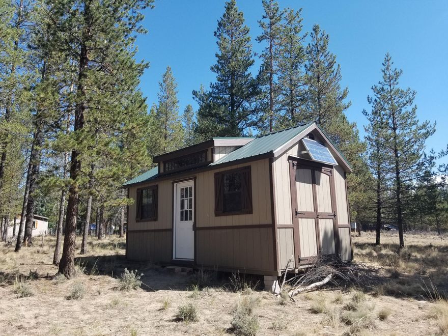 Nice elevated, corner, 1.00 acre lot. new upgraded 10 X 20 Shed, with a 100 watt Solar Panel, 400 watt/ac Inverter & 2 Deep Cycle batteries. Well has been drilled and septic feasibility study is completed for a standard  septic system. Ready for you to begin building a home. Community maintains the roads and plows the snow in the winter. Sun Forest Estates is close to all your favorite outdoor activities. Klamath County offers lower property taxes! Seller may Carry Financing with 50% Down Payment. Head out today!