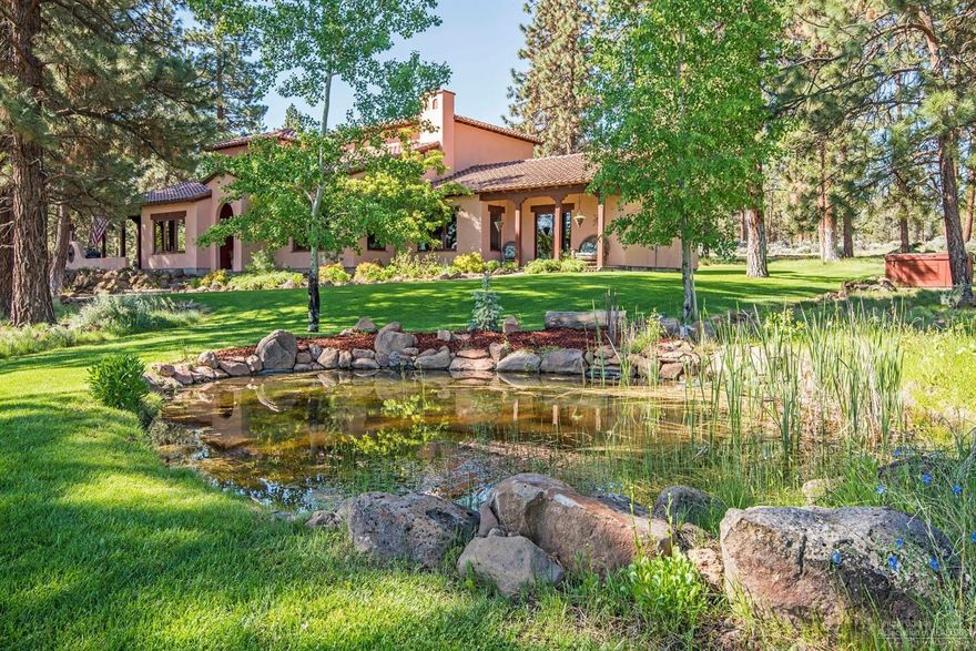 This southwestern, 31-acre private ranch in the exclusive Old Military neighborhood is a quiet respite and getaway retreat for all ages. The 3,567 SF home features an open layout with 2,942 on the main level & upstairs bonus room. Quality craftsmanship includes distressed oak & southwestern tile floors, solid alder doors, wood casement windows, exposed beams and painted tile accents, red barrel concrete tile 40-year roof, multiple patios, a balcony, and ornamental ironwork. A 4,000 SF Barn has 5 stalls, paddock, tack room, 12' x 16' workshop, hay & equipment storage. The barn ranch hand quarters includes a gathering area, loft, kitchenette, and full bath. The landscaping naturally blends in with the surrounding environment with 2 ponds, a water feature, fenced irrigated pastures & equestrian riding area. A 360-degree view of open terrains offers a view of Mt. Jefferson from the main house, Black Butte & Three Sisters views from the east of the property and no view of neighbors.