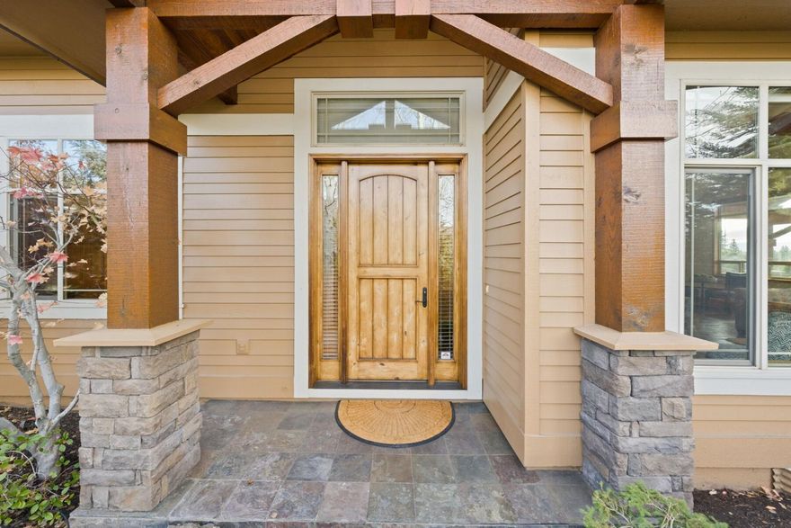 Luxury single-level townhome where comfort meets elegance! Stunning 3-bedroom, 2.5-bathroom residence boasts 2,120sf of sophisticated living, perfectly designed for modern comfort. Step into the sunlit living room featuring vaulted ceilings and expansive windows that frame views of the Cascade Mountains. Hickory flooring adds warmth and charm, complemented by a cozy gas fireplace. Create your favorite meals in the spacious kitchen featuring Sub-Zero fridge and Viking range with hood. Enjoy outdoor living on the covered back patio, with beautiful landscaping, privacy fence, and serene water feature. The primary suite offers direct patio access, creating a personal retreat. This home includes a generous laundry room and attached 2-car garage for your convenience. Located minutes from NW Crossing, downtown Bend, Mt. Bachelor, parks and trails.