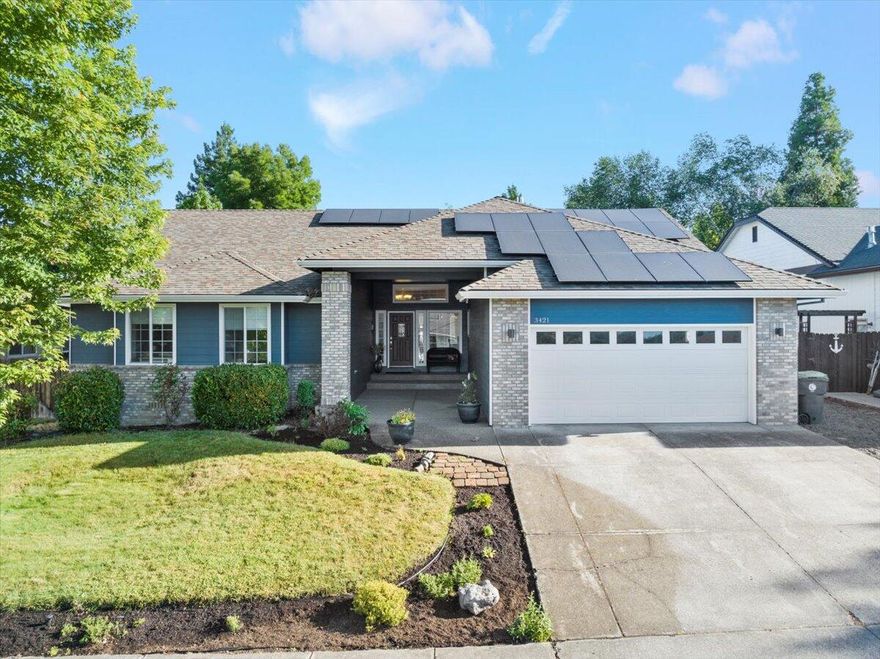 Experience modern living in this Beautiful, single-story, 4 Bedroom, 2 Bath home completely renovated in 2016!  Featuring granite countertops, large kitchen island, pantry, laminate plank flooring and stainless appliances, every detail has been thoughtfully updated, including lighting and plumbing fixtures, Interior and Exterior Paint.  $100,000 in upgrades!  Enjoy spacious rooms, Primary Bedroom with ensuite bathroom & walk-in closet, cozy Family Room and an open, welcoming Living Room & Dining Room. The expansive front walkway and porch offer peek-a-boo views of the valley, adding to the charm of this lovely home.  The private backyard boasts a garden and covered patio, perfect for relaxation or entertaining.  Plus, New Roof in 2016 with Solar Panels installed in 2020, you'll pay only a small monthly service fee for power!  Located in the desirable East Medford neighborhood with top-rated schools, Lone Pine Elementary, Hedrick and North Medford High School.  This home is a must-see!