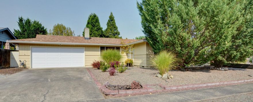 This one is as cute as they come and move in ready.  3 bedrooms and 2 full bath almost 1200 sf sitting on a large .21 manicured lot.
Originally built in 1973 but many updates over the years including a new roof and gutters in 2019. Updated countertops and faucet in 2018.Updated HVAC system in 2017 and replaced gas hot water heater in 2014. The garage door is new as of 2011 and at that time was tested for lead based paint with no evidence.
You enter the home in the living room which features a fireplace plumbed for gas. The kitchen is well appointed and will come with the refrigerator, dishwasher and range oven.
The dining room has views to backyard and access to the back patio. The backyard is large but low maintenance with the mature trees for privacy and raised garden beds with drip systems.
The garage is attached 2 car with laundry facilities with workbench and storage.