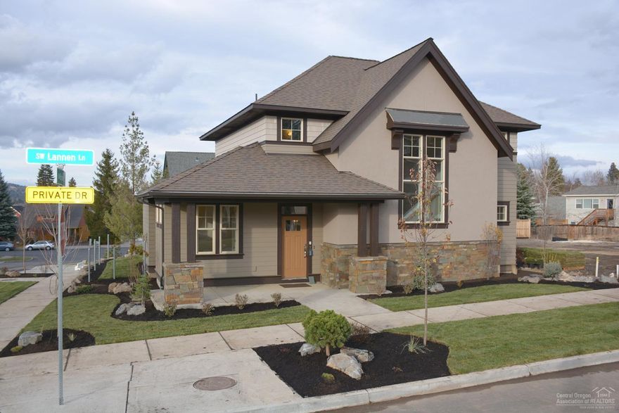 Two story Shingle Style home. 3 bedrooms, 3.5 bath rooms. Stunning two story staircase with tall windows over looks dining room. Master on main. Upper floor has 2 bedrooms, two full baths and bonus room. Office on main floor. Exterior: Stucco, real stone, shakes and lap siding. Close to everything:Old Mill District, Market of Choice, Parks,River,Hiking & Biking. Professional grade kitchen, Quartz solid counter tops throughout. 2 car garage, and access to attic storage. Fully landscaped with fence.