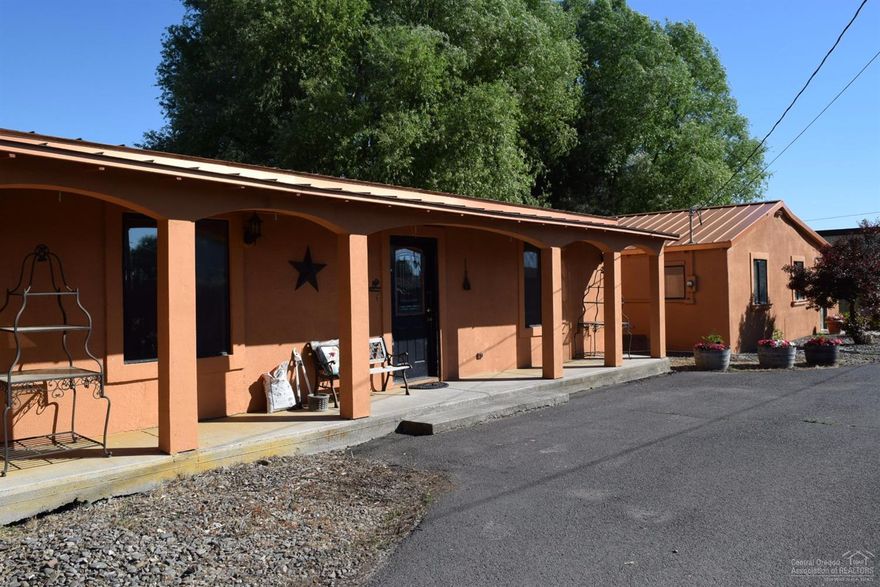 Artist's Retreat is 4067 sq ft, 15 rooms including 4 bedrooms, 3 baths. This handcrafted retreat has the heart of mid-century living and all the elegance of thousands of square feet of custom tile. Entertaining areas abound, second matching building, a huge indoor swimming pool complex 4' to 12' deep, shop 25 x 36 sq ft. This property sold As Is, some repairs needed. Sellers will make no repairs. State required water tests passed. Septic pumped. Seller Prefers cash offers. Priced at $61.47 per square foot.