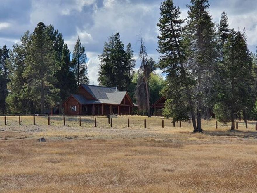 Now's your chance! Previously a cattle ranch, this 392 acre property could be yours & owner is willing to carry w/60% down! Beautiful home & detached garage w upstairs bonus area have brand new roofs. Incredible grazing meadow next to the home. Livestock barn/working pens in need of repair. Compartments in the big shop could be removed. 5 separate tax lots & Seller thinks with removal of some trees you may be able to see The Sisters Mtns. It's a project, but perfectly live-able while you work!