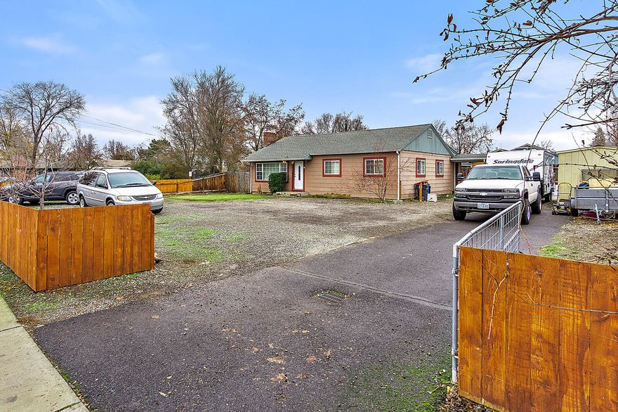 Charming 1244 sq ft home with 3 bedrooms, 1 bathroom and a 1 bedroom guest house. Main house offers hardwood floors, spacious kitchen, wood burning fireplace, large living room with large window to let the light flood in. Legal guest house with kitchenette, bedroom, bathroom, living room and laundry room would be an ideal in-law set up. Large .21 acre lot with RV Parking.