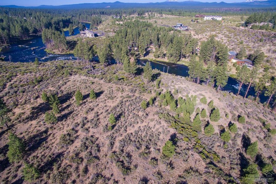Incredible development opportunity in SW Bend with room for 11 premium river view rim lots, more w/mountain views & partial river view, water rights, adjacent to res. neighborhood w/4 utility stubs to that parcel & 40 acre wildlife reserve; direct access to riverfront park & Deschutes River Trail. Purchase as an estate parcel with future development potential or develop now. One of a kind property within Bend City Limits.