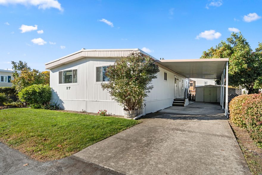 Move-in ready and well-maintained 2 bed, 2 bath double-wide in Candlewood Park, a desirable 55+ community in Talent. Enjoy a spacious kitchen with plenty of storage and counter space, recently painted exterior, and included appliances: washer, dryer, range, dishwasher, and refrigerator. The private, low-maintenance fenced yard features water-wise landscaping and TID well access for gardening. Relax on the large deck, use the storage shed, and park easily under the covered carport. Candlewood Park offers a quiet, friendly setting close to public transit and shopping, with community green space, a shared garden, and optional free RV storage.