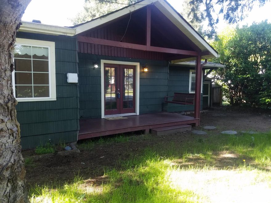 Seller says time to go!.. Huge reduction... bring all offers...Seclusion so close to town! 2 large master bedrooms, 2 baths, 3rd small room for office nursery, exercise, or 3rd bedroom on large .21 of an acre corner lot with tall privacy hedges all the way around the property. Big back yard and glass green house included. Split floor plan, Hard wood floors throughout, some newer windows, upgrades from remodel, French doors, ceiling fans, nice counter tops, dishwasher, granite and glass shower in bath, attached bonus vault or man cave room, mini split A/C system, close to everything, one of the best values out there, a must see... come take a look today.