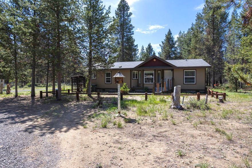 $3,000 credit towards buyer's closing cost! This beautiful property features a 3 bedroom, 2 bathroom home set on a private 1-acre lot with mature trees all around. The interior offers an open floor plan with laminate floors throughout. Walk-in closets in both primary bedroom and one of the guest bedrooms. Step outside and you will instantly enjoy the peace and quiet. Fenced in yard, two sheds for additional storage and plenty of space for RV parking and more. Don't miss your opportunity to own this home!