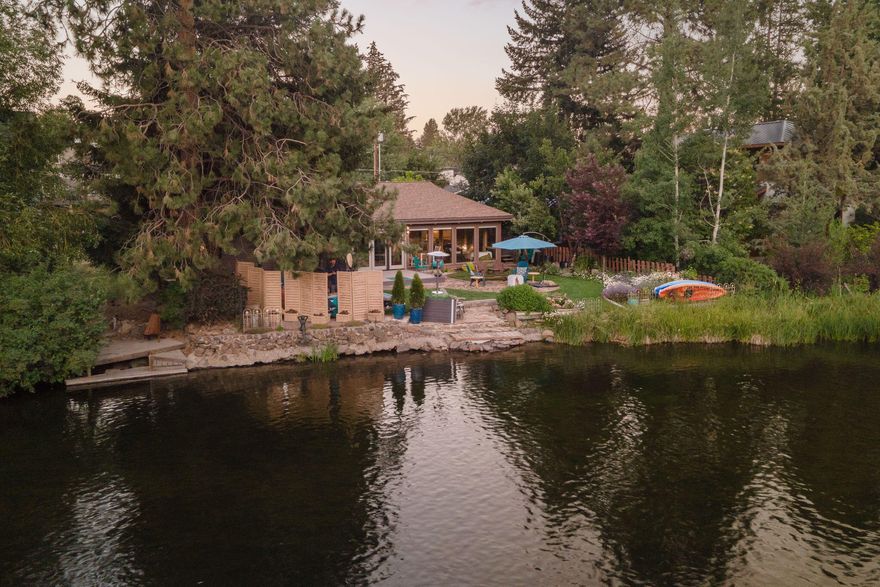 Legacy one-of-a-kind property on the Deschutes River near Drake Park in Downtown Bend. Step into the river with your favorite watercraft via the private dock from your landscaped oasis. Huge tiled-sunroom with floor to ceiling windows to bask in your amazing river views. Lovingly and meticulously remodeled in 2018. Don't miss out on the opportunity of a lifetime, for your family to enjoy for generations to come!