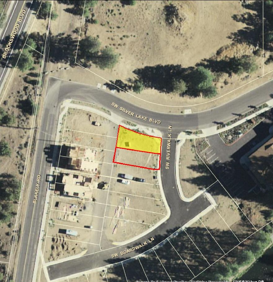 One of the last two remaining townhome lots in the desirable Rivewalk subdivision.  Amazing SW location, a quick walk down to the Old Mill district, Blakely Park and the Central Oregon irrigation district canal trail.  Utilities in place, bring your builder and plans.  Buyer must also purchase adjoining townhome lot #24.