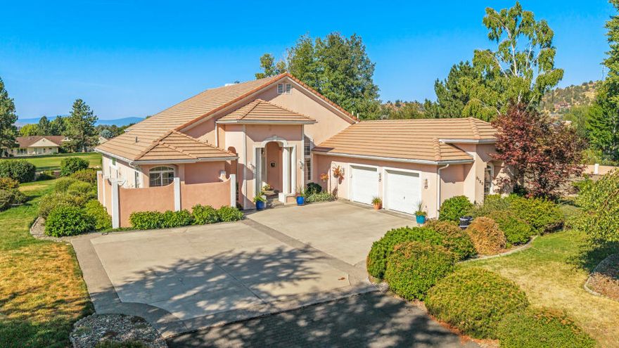 Beautifully maintained home on the 9th hole in the much-desired Shield Crest subdivision! Don't miss out on this opportunity to own this immaculate home with an open floor plan, formal and informal dining, sitting room, family room, bright vaulted ceilings, large primary bedroom with two walk-in closets and large primary bath with jetted tub, tile shower and double sink, split floor plan, two car garage, new septic tank being installed, recent well flow on file, and over an acre of landscaped yard. All this and golfing right out your back door!