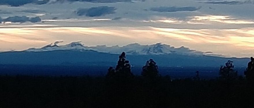 Stunning Cascade Mountain views, star gazing and wildlife watching are yours with this 10 acre land parcel just 35 minutes east from Bend's medical facilities and 10 minutes west of Prineville Reservoir. You will have a head start with this offering... a CUP is in place for building, a solar system with a 1600 watt array, a1600 watt 40' wind turbine and a 5000 watt inverter for power generation, plus a generator for back up power, a circular driveway, an already approved septic feasibility for capping fill with drain field trenches already dug.  There is a 750 gallon water cistern, partial fencing plus home site foundation trenches in place.  One shed is converted to a livable tiny home with full bath and partial kitchen, covered deck and propane heat, plus an existing RV septic holding tank is inground. The top 1/3 of the land is more open  space and views, bottom 2/3 of the parcel is wooded with over 300 juniper trees, and a short drive to the OHV trails.  Imagine the possibilities!