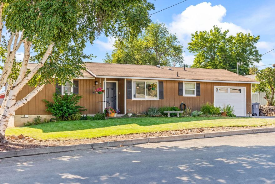 Charming and updated home in a great location! This delightful 2-bedroom, 1- bath home is full of recent updates and ready for your to move right in! Enjoy the fresh look and feel with new laminate flooring, updated light fixtures, fresh interior paint, newer windows, and a beautifully updated bathroom. The kitchen is light and bright with painted cabinets, updated counters, sink and faucet. The functional layout offers comfortable living space, and the attached garage adds convenience. Outside, you'll love the large fenced backyard: perfect for pets, play or gardening....plus a handy storage shed for all your extras. Located in a desirable neighborhood close to schools, shopping and parks, this home blends comfort, style and location into one inviting package.